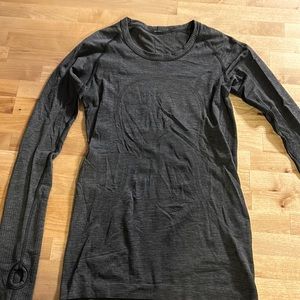 Lululemon longsleeved swiftly tech shirt, size 6, very dark, gray nearly black